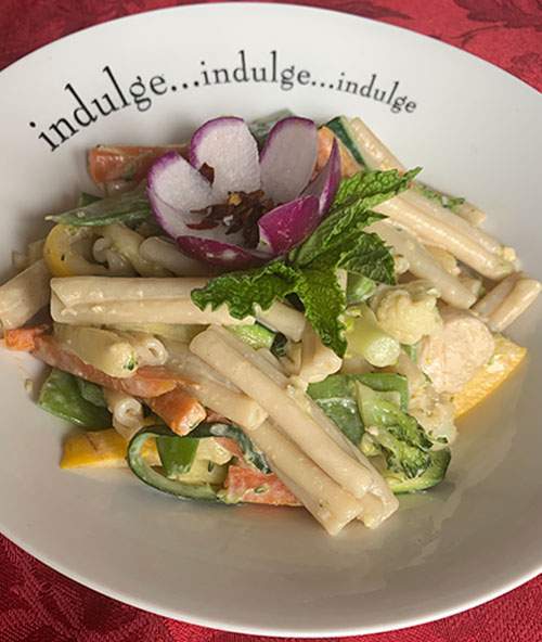 Tahini chicken with vegetables and pasta